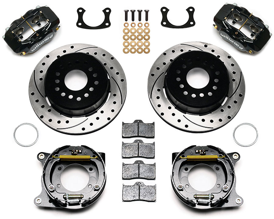 Classic Ford rear disc brake kit featuring black 4-piston caliper, 12.19-inch drilled and slotted vented rotor, and bolt-on brackets for 1963-1974 Mustang, Torino, and Fairlane models.